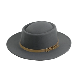 Detail of grey wool felt fedora featuring a vintage brown leather belt and golden buckle
