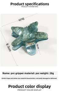 Dettaglio molletta per capelli a stella marina verde 9cm con trama marmorizzata