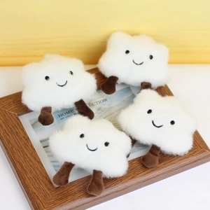 Set of four cute white cloud plush dolls with soft faux fur and hanging keyrings