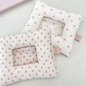 Detail of pink cotton star and polka dot card holders with durable webbing handles