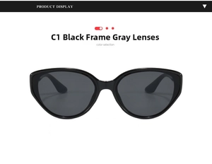Detail view of cat eye sunglasses with glossy black frames and dark grey lenses
