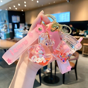 Portachiavi a forma di coniglio rosa con sabbie mobili e cinturino in silicone