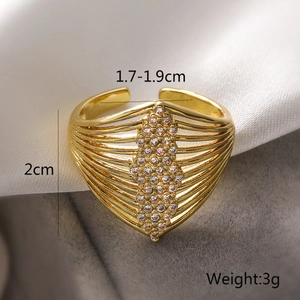 Detail of 18K gold-plated wavy geometric ring featuring sparkling vertical zircon accents
