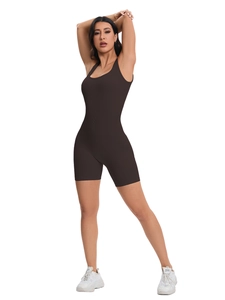 Detail of seamless ribbed brown romper showing the breathable knit fabric and U-neckline