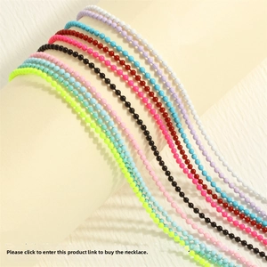 Detail of colorful bohemian beaded bracelets with glossy painted finish on display stand