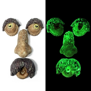 Detailed comparison of tree face resin decor showing realistic bark texture and green glow