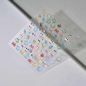 Detailed macro view of 3D macaron jelly nail stickers with star and eye patterns Co-072