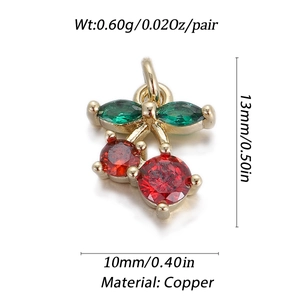 Detail of red cherry pendant with dimensions 13mm by 10mm in gold-plated copper