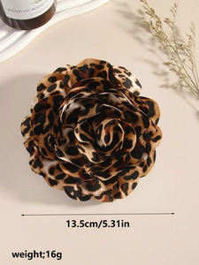 Macro view of leopard print fabric rose brooch showing 13.5cm size and lightweight detail