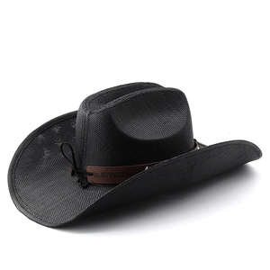 Detail view of a black woven cowboy hat with brown embossed leather band and knotted detail