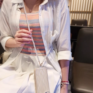 Crossbody pearl bead phone lanyard with detachable metal clips and wavy beige case