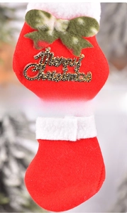 Detailed front and back view of red felt Christmas mini stocking with gold tag