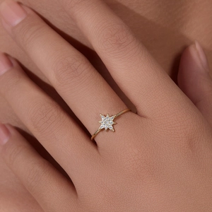Elegant gold-plated S925 sterling silver star ring featuring sparkling zircon stones