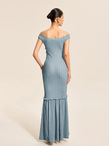 Back view of sexy backless light blue knitted mermaid dress showing fit and texture