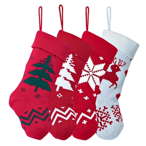 Set of 4 red and white knitted Christmas stockings with reindeer and snowflake patterns