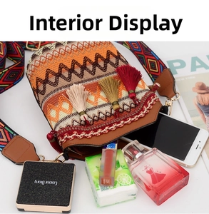 Detail showing inner capacity of embroidered boho bucket bag with colorful tassels