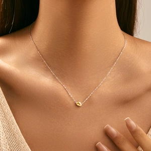 Elegant s925 silver necklace with oval yellow gemstone pendant worn on neck