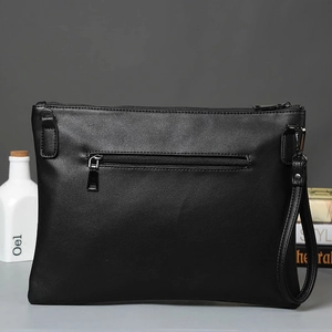 Classic black leather motorcycle clutch with punk rivets and functional front zipper