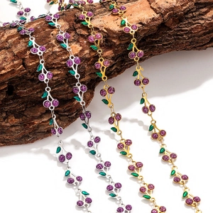 Handmade cherry pendant necklace in gold and silver finish with purple glitter details