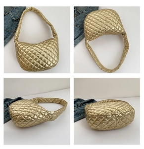 Detail views of gold metallic quilted crossbody bag with large diamond stitching textures