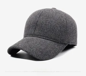 Detail view of heather grey wool baseball cap with stiff brim and warm winter texture