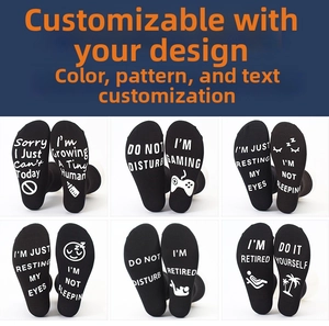 Close-up of cotton gaming socks with non-slip white rubber lettering on black soles
