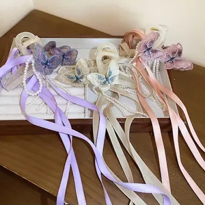 Eleganti mollette per capelli a farfalla con nastri e perle in lilla e rosa set