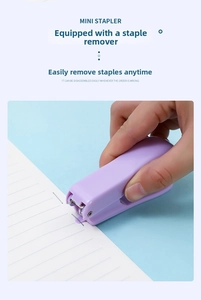 Macro shot of purple mini stapler featuring an integrated staple remover tool on its tail