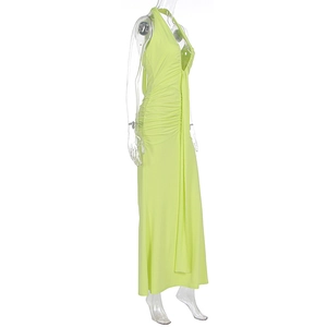 Detail showing the ruched design and sleek fabric of the lime green halter maxi dress