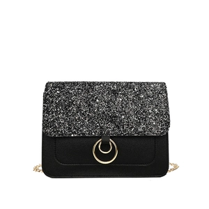 Elegant black sequin crossbody bag with golden chain strap and double ring ornament