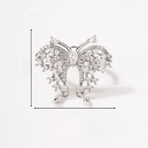 Detail shot of silver butterfly ring with zircon stones showing precise dimensions