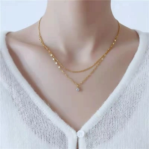 Double-layer gold water-wave chain necklace featuring a single round zircon pendant