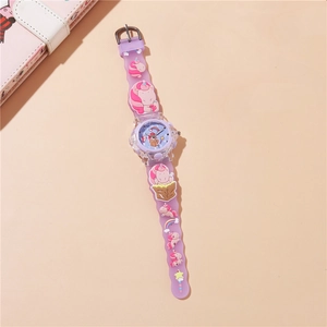Close-up of purple silicone watch strap featuring 3D cartoon unicorn and rainbow motifs