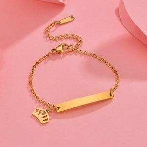 Gold minimalist stainless steel child bracelet with engravable bar and crown charm