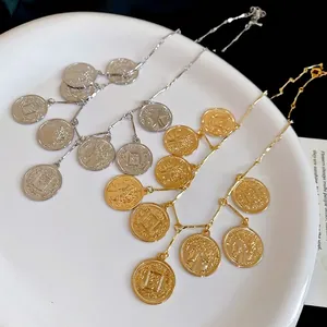 Retro metallic multi-pendant coin necklace with embossed portrait in gold and silver finish