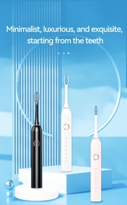 Detailed trio of electric toothbrushes in black, white, and pink on a premium stand