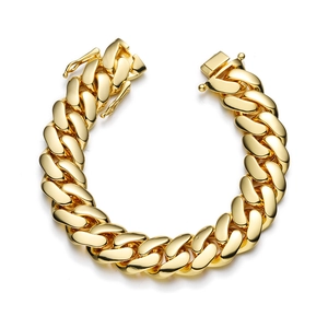 Detailed close-up of 10mm-22mm gold-plated Cuban chain bracelet with butterfly buckle