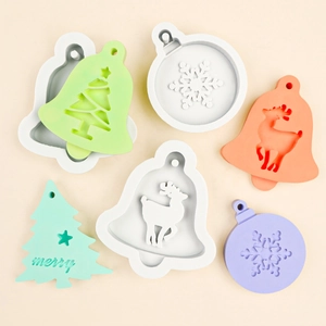 Christmas silicone molds featuring bell, tree, and snowflake shapes for aroma gypsum pendants