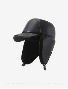 Detail of black winter trapper hat showing warm faux fur lining and buckle ear flaps