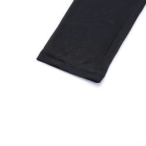 Detail view of the intricate overlock stitching on the black mesh dress sleeve edges