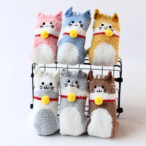 Cozy coral fleece cat-themed fuzzy socks in assorted colors with bell detail