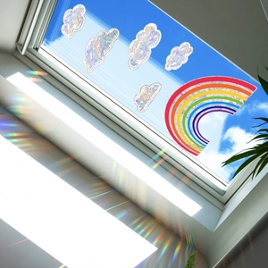 Prism window stickers with rainbow cloud shapes creating colorful light reflections
