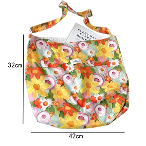 Detail of floral oil painting canvas tote showing 42cm width and 32cm height dimensions