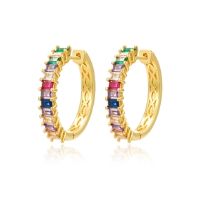 Macro shot of gold hoop earrings featuring rainbow baguette-cut zircon and wave hollow design