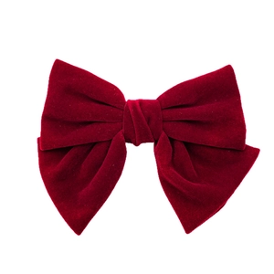 Large red velvet bow hair clip with a minimalist spring clasp design for women