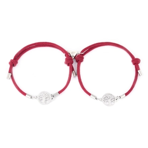 Detail of red braided Tree of Life bracelets with magnetic heart closure for couples