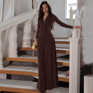Deep brown long sleeve maxi dress featuring elegant deep V-neck and pleated waist details