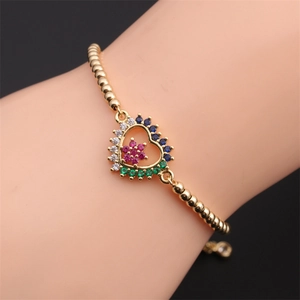 Adjustable gold heart bracelet with colorful cubic zirconia stars and floral center for women