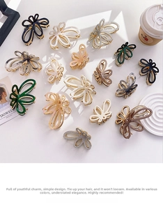 Detail shot of acetate butterfly hair claws in various colors like amber and marble