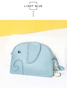 Detail of light blue elephant coin purse featuring lychee grain leather and keychain